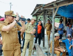Sambangi Desa Bandar Rahmat, Pj. Bupati Nizhamul Prihatin Lihat Kondisi Bangunan Sekolah