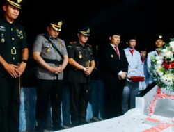Pj. Bupati Batu Bara Pimpin Pawai Obor dan Upacara Taptu Sambut HUT ke-79 Kemerdekaan RI