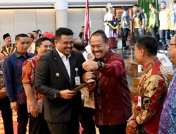 Gubsu Bobby Serahkan DBH ke Batu Bara, Bupati Baharuddin Prioritaskan untuk Pelayanan Kesehatan
