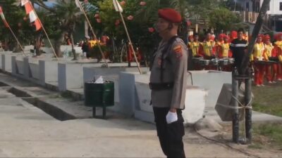 Bhabinkamtibmas Polsek Indrapura Jadi Komandan Upacara HUT ke-80 RI