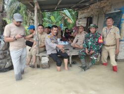 Kapolsek Meninjau Lokasi Banjir di Medang Deras