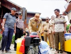 Dukung Swasembada Pangan Bupati Batu Bara Ikut Panen Padi dan Salurkan Bantuan Pertanian